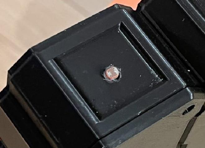 Close up photograph of the photoresistor on the giant clock